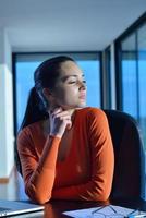 relaxed young woman at home photo