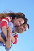 happy young romantic couple have fun relax photo