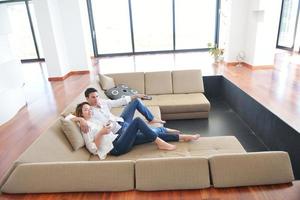 young couple relax at home photo