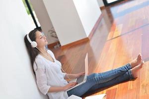 relaxed young woman at home photo