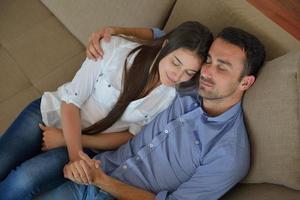 young couple relax at home photo