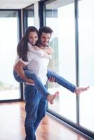 happy young romantic couple have fun and  relax at home photo