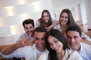 group of friends taking selfie photo