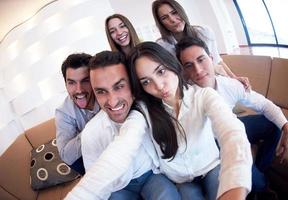 group of friends taking selfie photo