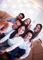 group of friends taking selfie photo