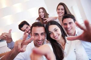 group of friends taking selfie photo