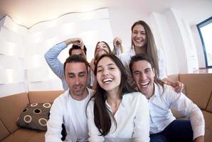 group of friends taking selfie photo