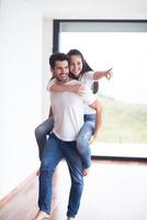 happy young romantic couple have fun and  relax at home photo