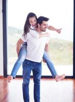 happy young romantic couple have fun and  relax at home photo