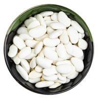 top view of white beans in round bowl isolated photo