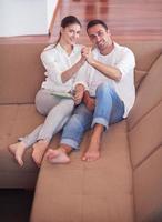 happy young romantic couple have fun and  relax at home photo