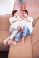 happy young romantic couple have fun and  relax at home photo
