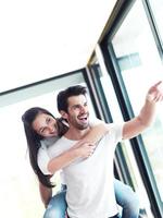 happy young romantic couple have fun and  relax at home indoors photo