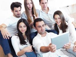 group of friends taking selfie photo