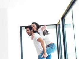 happy young romantic couple have fun and  relax at home indoors photo