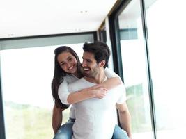 happy young romantic couple have fun and  relax at home indoors photo