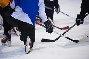 ice hockey players team meeting with trainer photo