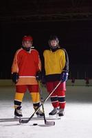 Retrato de jugadores de hockey sobre hielo de chicas adolescentes foto