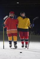 Retrato de jugadores de hockey sobre hielo de chicas adolescentes foto