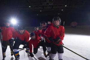 happy children gropu  hockey team sport players photo