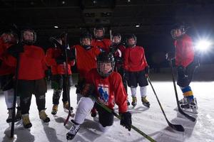 happy children gropu  hockey team sport players photo