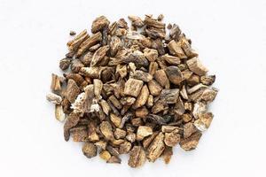 top view of pile of chopped dried burdock roots photo