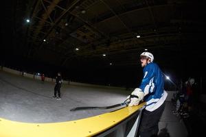 ice hockey players on bench photo