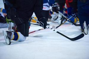 ice hockey players team meeting with trainer photo