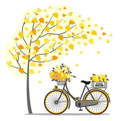 A bicycle with lemons and yellow flowers under an autumn tree.