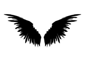 Pair of black raven wings isolated on white background. Vector ink wings illustration.