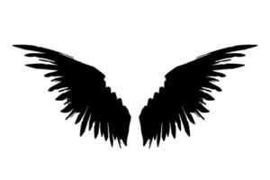 Pair of black raven wings isolated on white background. Vector ink wings illustration.