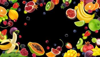 Frame made of fruits and berries isolated on black background photo