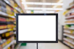 blank board with blur supermarket for background photo