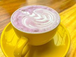 beautiful cup of Taiwanese taro milk drink with latte art photo