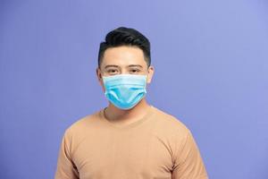 Men wear masks to prevent air pollution, White background, haze and PM 2.5 dust and smoke pollution in big cities. photo