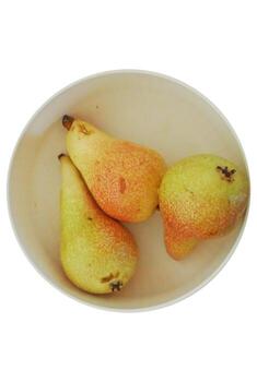 pears in a bowl from different angles isolated on white background photo