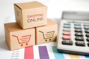 compras en línea, caja de carrito de compras en gráfico de negocios, exportación de importación, comercio financiero.