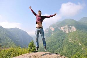 man jump in nature photo