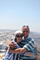 feliz pareja joven turistas en grecia foto