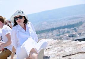 Greek woman on the streets of Oia, Santorini, Greece photo