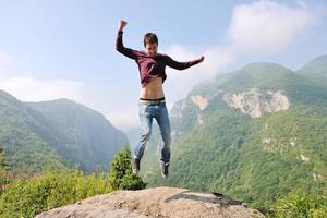 man jump in nature photo