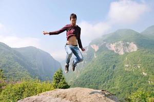 man jump in nature photo