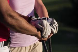 portrait of couple on golf course photo