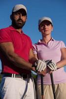 portrait of couple on golf course photo