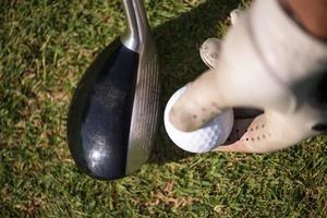 golf club and ball in grass photo