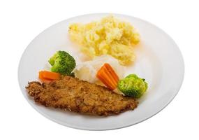 schnitzel on the plate and white background photo