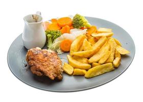 Cordon bleu on the plate and white background photo