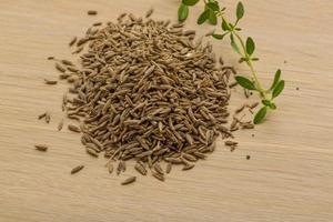 Zia seeds on wooden background photo