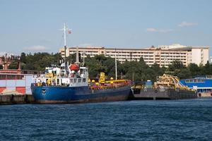 Cargo ship in port photo