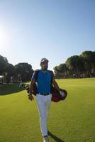 golf player walking photo